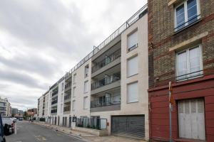 Budova, kde se apartmán nachází + 3 fotografie