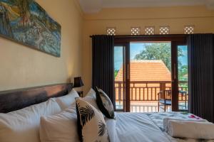 Postel nebo postele na pokoji v ubytování Baran Swaha Villa + 37 fotografií
