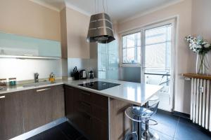 Kuchyň nebo kuchyňský kout v ubytování Le Cashmere - au centre de tout