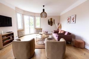 Posezení v ubytování Le Cashmere - au centre de tout