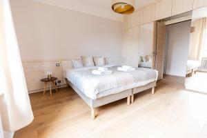 Postel nebo postele na pokoji v ubytování Le Cashmere - au centre de tout + 15 fotografií