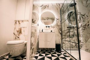 Et badeværelse på Le Majestic - T2 en centre ville