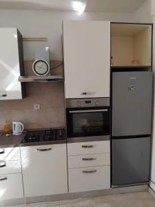 Dapur atau dapur kecil di Apartment Robi