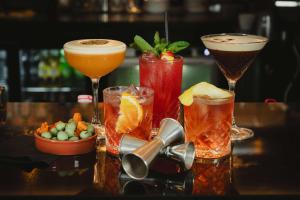 a group of three cocktails on a table at DoubleTree by Hilton Bristol South - Cadbury House in Yatton +111 photos