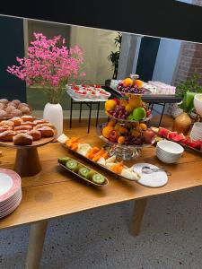 a table with many different types of fruits and vegetables at Ca' Bonfadini Historic Experience in Venice