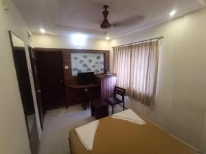 Voodi või voodid majutusasutuse Hotel Aditya toas