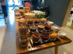 a table with many different kinds of food on it at Ca' Bonfadini Historic Experience in Venice