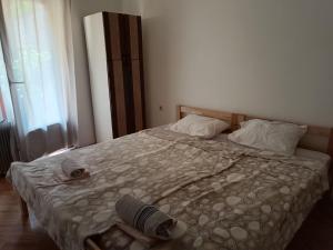Postel nebo postele na pokoji v ubytování GOLD Apartman