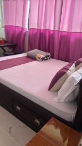 Katil atau katil-katil dalam bilik di Hotel Pema