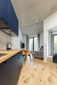 Kuchyň nebo kuchyňský kout v ubytování Homewell Apartments Lofty nad Wartą