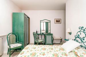 Postel nebo postele na pokoji v ubytování Hotel Sonia