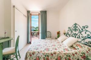 Postel nebo postele na pokoji v ubytování Hotel Sonia + 37 fotografií
