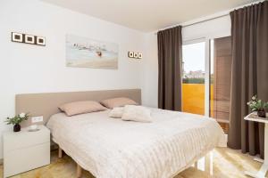 En eller flere senge i et værelse på Espanatour RECOLETA 21 + 23 billeder