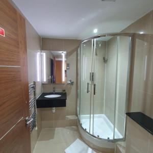 Koupelna v ubytování Oliver Hotel
