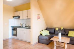 Kuchyň nebo kuchyňský kout v ubytování Ferienwohnung am See - Fischerhof Vipperow