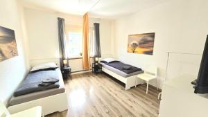 Postel nebo postele na pokoji v ubytování -CS24- 4 rooms apartment with balcony - KA01