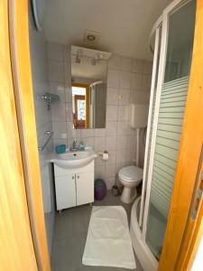 Kúpeľňa v ubytovaní Apartment Cacini Dvori + 19 fotografií