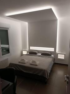 Postel nebo postele na pokoji v ubytování CIVICO 14 Holiday Rooms
