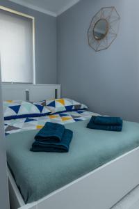 Posteľ alebo postele v izbe v ubytovaní Lovely place-apartament Oświęcim