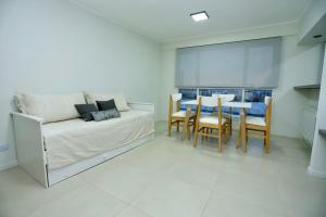 Katil atau katil-katil dalam bilik di Departamento en Trelew - céntrico y moderno
