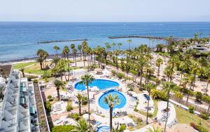 The swimming pool at or close to Apartment in beachfront complex in El Duque area, Costa Adeje