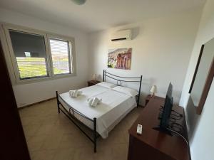 Postel nebo postele na pokoji v ubytování Villa Desìo