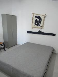 Ένα ή περισσότερα κρεβάτια σε δωμάτιο στο Cozy Beachfront Escape in Lilikas