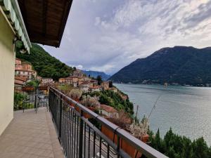 a balcony with a view of a body of water at Casa vacanze Flora con vista lago in Nesso
