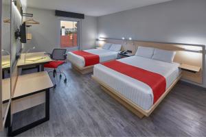 Postel nebo postele na pokoji v ubytování City Express by Marriott Queretaro + 37 fotografií