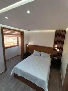 Ένα ή περισσότερα κρεβάτια σε δωμάτιο στο Luxury Apartment with Panoramic View