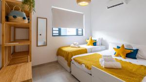 Voodi või voodid majutusasutuse Penthouse Mesa Bonita toas
