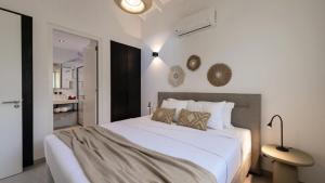 Voodi või voodid majutusasutuse Penthouse Mesa Bonita toas