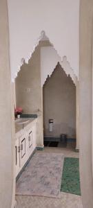 an empty kitchen with a sink and a counter at Villa Rayan Marrakech secteur Palmeraie dans Propriété de 2 hectares avec jardin arbres fruitiers in Marrakesh