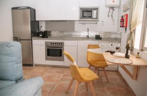 Kuchyň nebo kuchyňský kout v ubytování Apartamento en pleno centro historico