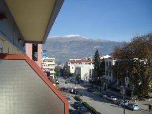 a view of a city street with a mountain at Hotel King Pyrros in Ioannina