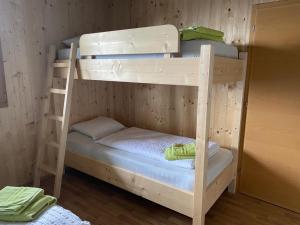 A bed or beds in a room at Familyparadies GAMPLALM