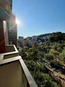 a view of a city from the balcony of a building at Daddy's house - maximum car length allowed 420cm in Genova