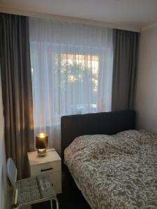 Postel nebo postele na pokoji v ubytování Apartament Euro Bytom + 22 fotografií