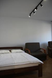 Posteľ alebo postele v izbe v ubytovaní Apartment Jerzmanowskiego Krakow