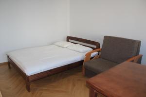 Posteľ alebo postele v izbe v ubytovaní Apartment Jerzmanowskiego Krakow