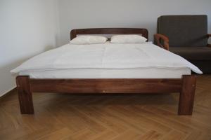Posteľ alebo postele v izbe v ubytovaní Apartment Jerzmanowskiego Krakow