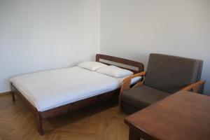 Posteľ alebo postele v izbe v ubytovaní Apartment Jerzmanowskiego Krakow