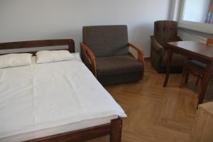 Posteľ alebo postele v izbe v ubytovaní Apartment Jerzmanowskiego Krakow