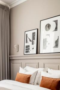 Letto o letti in una camera di Noel Suites