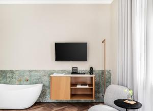 TV o dispositivi per l'intrattenimento presso Noel Suites