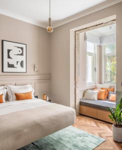 Letto o letti in una camera di Noel Suites