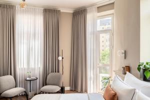 Area soggiorno di Noel Suites