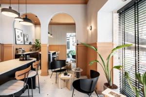 Area soggiorno di Noel Suites