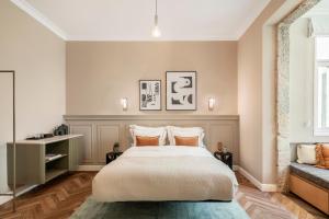 Letto o letti in una camera di Noel Suites