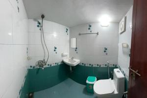 Koupelna v ubytování Beza Homestay + 13 fotografií